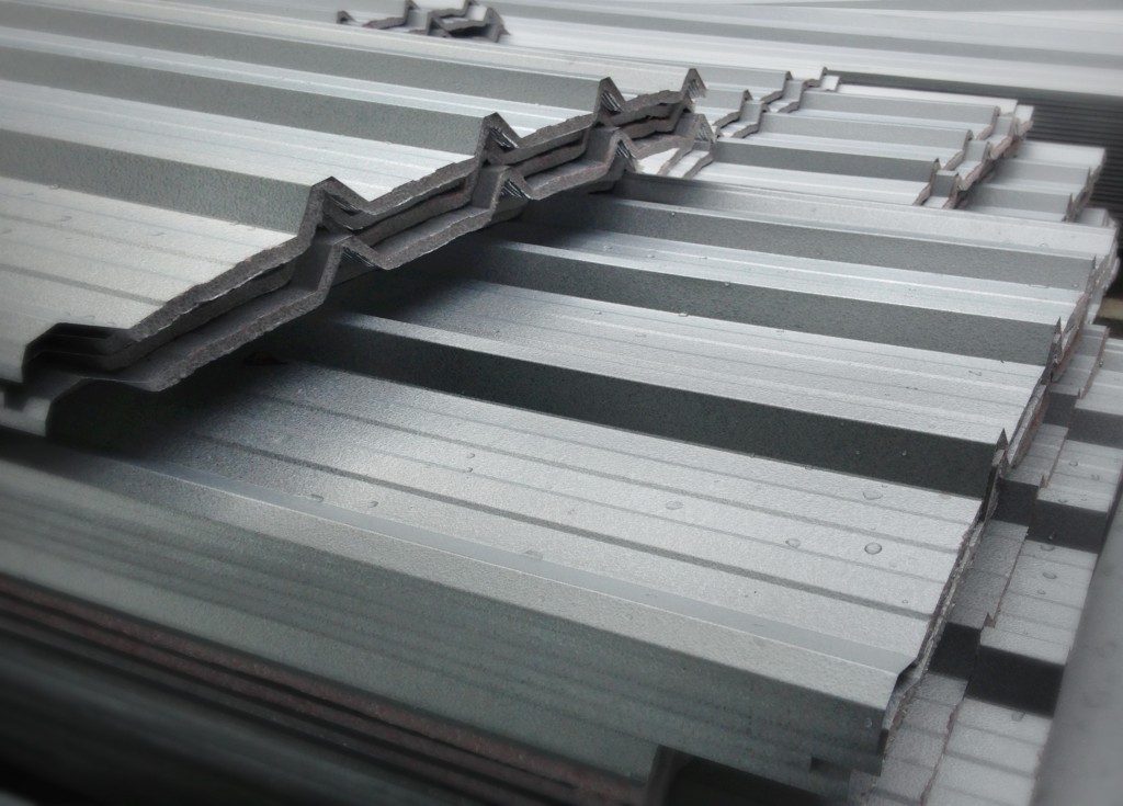 piled of metal roofing sheet